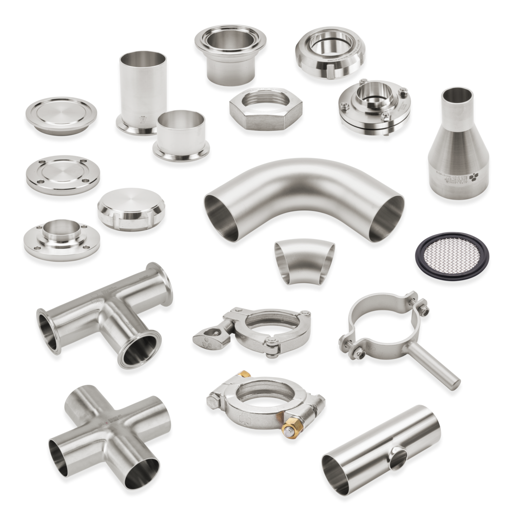 A collection of Alfa Laval high-grade stainless steel hygienic fittings and tri-clamp components engineered to the BS 4825 standard, laid out neatly on a clean white background for sanitary dairy and food processing applications.